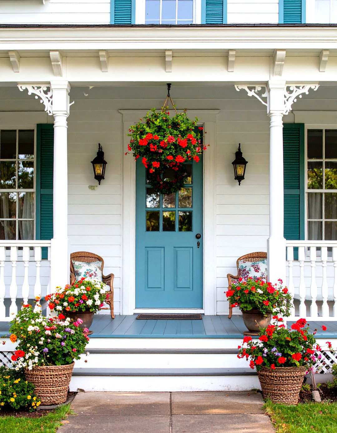 Victorian Farmhouse with Ornate Details - 24 White Farmhouse With Wrap-around Porch Ideas